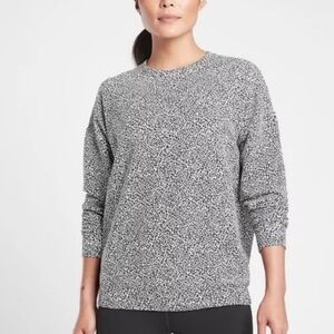 Athleta white and black leopard print sweatshirt top